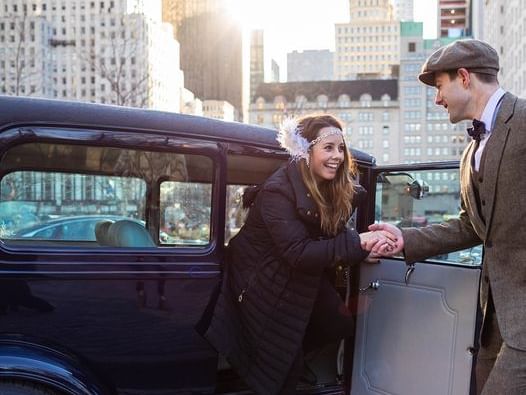 Man and lady hand shaking near the ArtHouse Hotel New York City